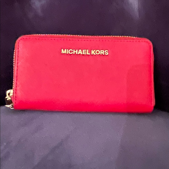 Michael Kors red zip around wallet - excellent preowned.